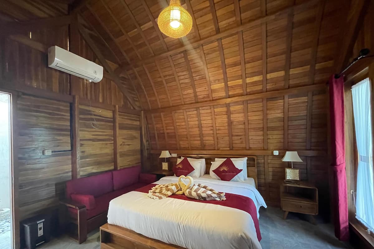 1 chambre, surmatelas, minibar, bureau