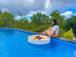 Outdoor pool, pool umbrellas, pool loungers