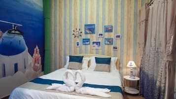 Deluxe Room, 1 Queen Bed | 1 bedroom, iron/ironing board, free WiFi, bed sheets