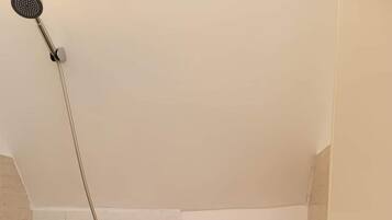 Shower, free toiletries, slippers, bidet