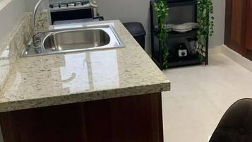 Comfort Studio, 1 Queen Bed, City View | Private kitchen | Paper towels