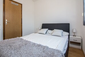 Family Apartment A1 | 2 slaapkamers, een strijkplank/strijkijzer, reisbedje, gratis wifi