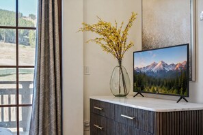Modern Console Vignette with Mountain TV View