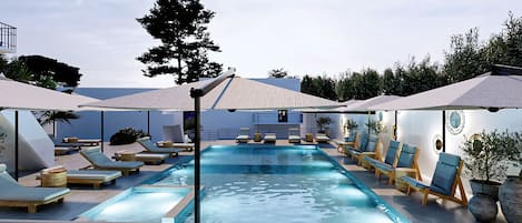 Seasonal outdoor pool, pool umbrellas, pool loungers