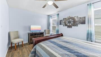Family House, 3 Bedrooms, Balcony, Beach View | Living area | 50-inch Smart TV with cable channels, TV