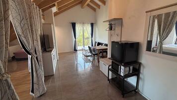 Eco-friendly toiletries, hair dryer, heated floors, towels