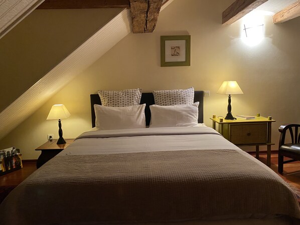 1 bedroom, desk, iron/ironing board, travel crib