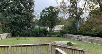 Charming house with a large fenced lot in a central location