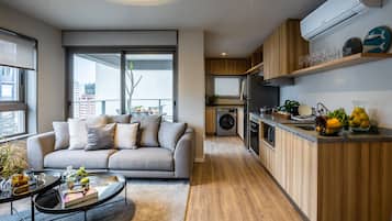 Premier Apartment | Living area | 29-inch Smart TV with digital channels