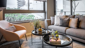 Premier Apartment | Living area | 29-inch Smart TV with digital channels