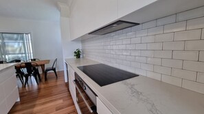 Fridge, stovetop, dishwasher, toaster