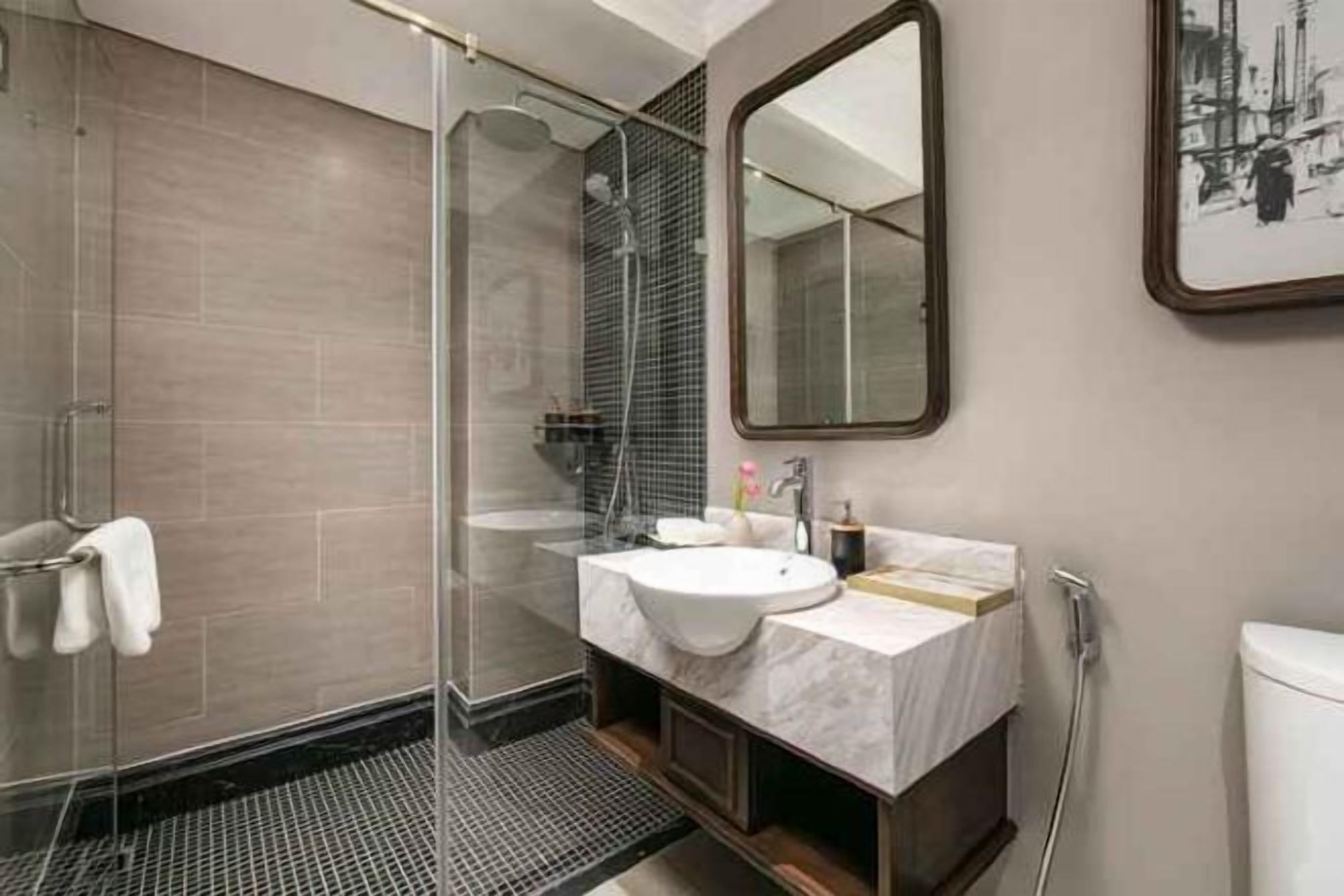 Hydromassage showerhead, designer toiletries, hair dryer, bathrobes