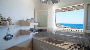 Frigorifero, forno, piano cottura, macchina per tè/caffè