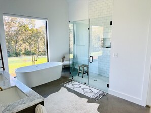 Bathtub, hair dryer, towels, soap