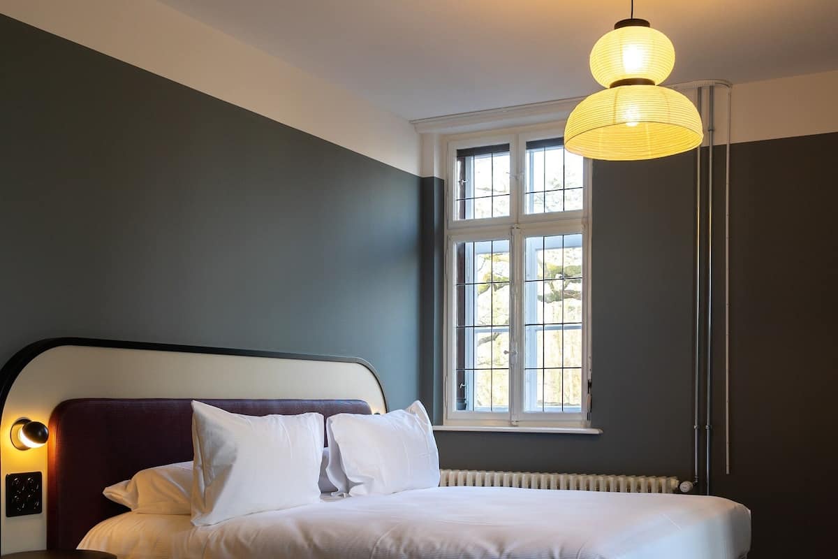Boutique Family Room | Hypoallergeen beddengoed, donzen dekbedden, een gratis minibar