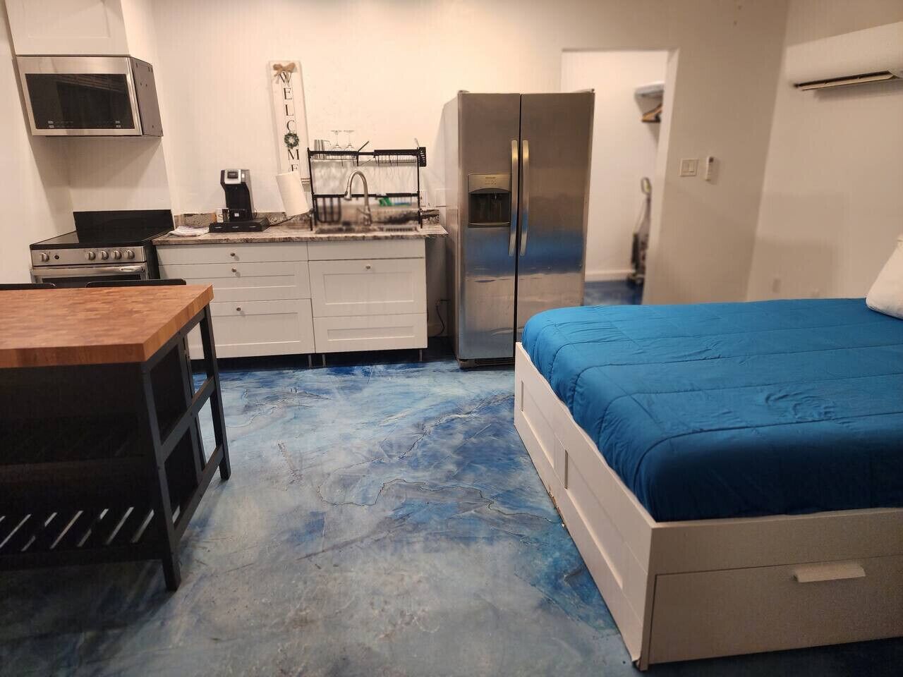 1 bedroom, desk, iron/ironing board, travel crib