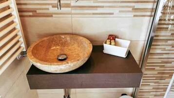 Shower, eco-friendly toiletries, hair dryer, bidet