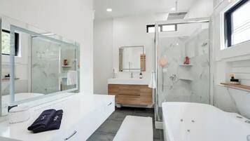 Jetted bath, hair dryer, towels, soap