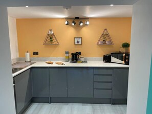 Apartamento, 1 cama Queen | Parte interna