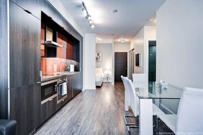 Traditional Apartment | Dining room - Skyline Suites - Next to MTCC, ACC & CN Tower (Toronto)