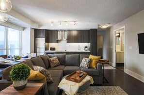 Family Apartment | Living area | 42-inch flat-screen TV with cable channels