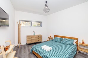 2 quartos, ferros/tábuas de passar roupa, Wi-Fi de cortesia