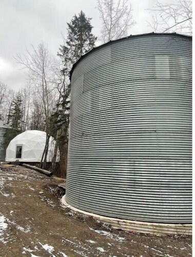 2 level Grain silo home, private forest at lake.