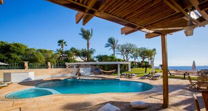 Sea Front Suites with Private Pool and Beach Access