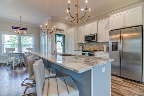 Bright beach house steps from the sand & memories