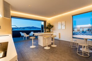Design Apartment | Private kitchen | Full-size fridge, microwave, oven, stovetop - Quarters B1- Luxurious & Spacious (Dunedin)