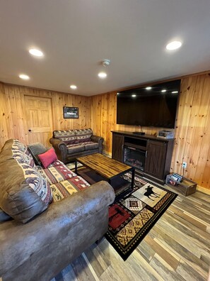 Smart TV, fireplace, foosball, books