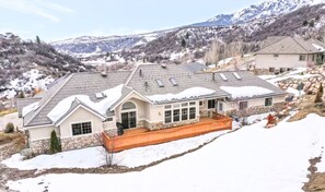 A stunning retreat surrounded by snow-covered mountain scenery.