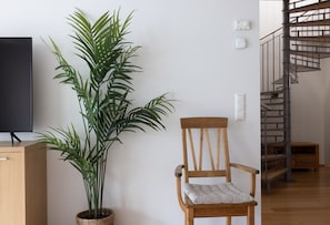 Exclusive-huoneisto | Oleskelualue | 36–tuumainen taulutelevisio, jossa kaapelikanavat