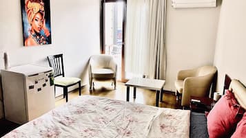 Desk, laptop workspace, free WiFi, bed sheets