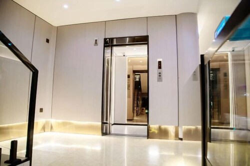 Huiqian Hotel (Zhaotong Fortune Store)