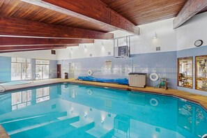 Indoor pool, a heated pool - Bright, welcoming condo with pool, hot tub, gas fireplace, fitness room, balcony (Winter Park)