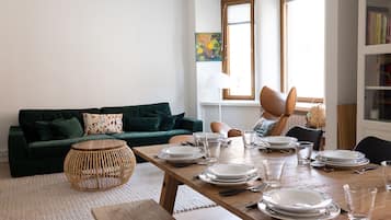 Superior Apartment | Living area | 36-inch TV with cable channels