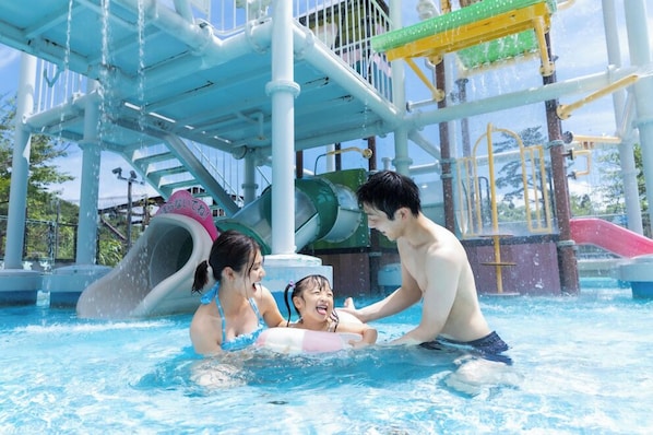 Seasonal outdoor pool, open 9:00 AM to 5:00 PM, pool umbrellas