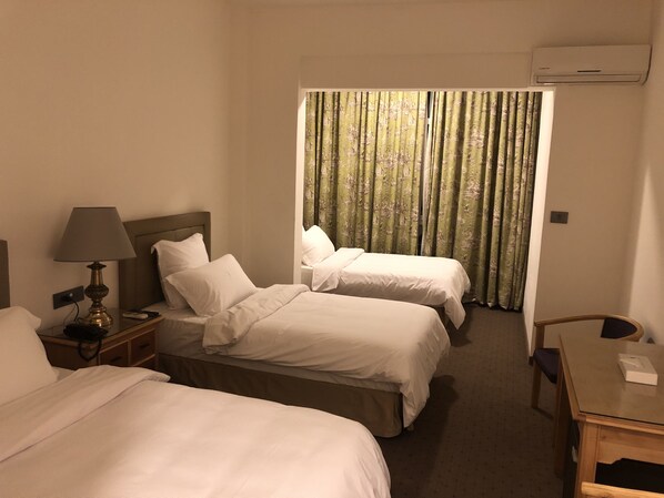 Literie de qualité supérieure, minibar, décoration personnalisée