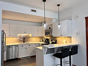 Condo família | Cozinha privada | Chaleira elétrica, torradeira