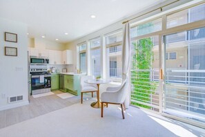 Fridge, microwave, oven, stovetop - 103 - Belltown Apartment (Seattle)