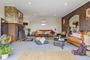 Family House | Living area | 65-inch Smart TV with satellite channels, TV, fireplace