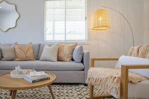 TV - Fairways Beach House - Stylish Beach House with Pool, Walk to Cafes, Beach, Pets OK, Golf Course View (Sawtell)