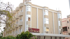 A hotel with a sign reading "ANT PALACE HOTEL & RESTAURANT". - Hotel Kant Palace (Agra)