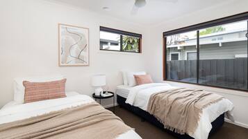 4 bedrooms, desk, iron/ironing board, travel cot