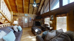 Cabin, Multiple Beds, Hot Tub | Living area | 40-inch TV with cable channels, fireplace