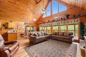 Cabin, Multiple Beds, Hot Tub | Living area | 40-inch TV with cable channels, fireplace