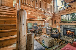 40-inch TV with cable channels, fireplace