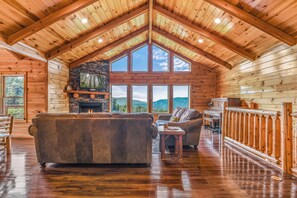 40-inch TV with cable channels, fireplace