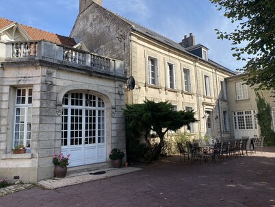 Beautiful former Hunting Lodge with spacious authentic rooms and garden with terraces